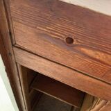 White counter with brass coin mechanism