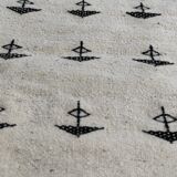 White and black carpet with berber patterns hand-woven in natural wool