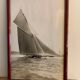 Three black and white-themed photographs sailboat boat with mahogany frame