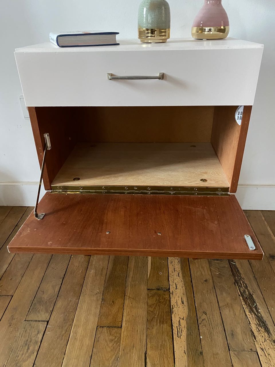 Wooden bedside table and nude