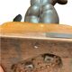 Ceramic statue with a wooden base after Giraud.