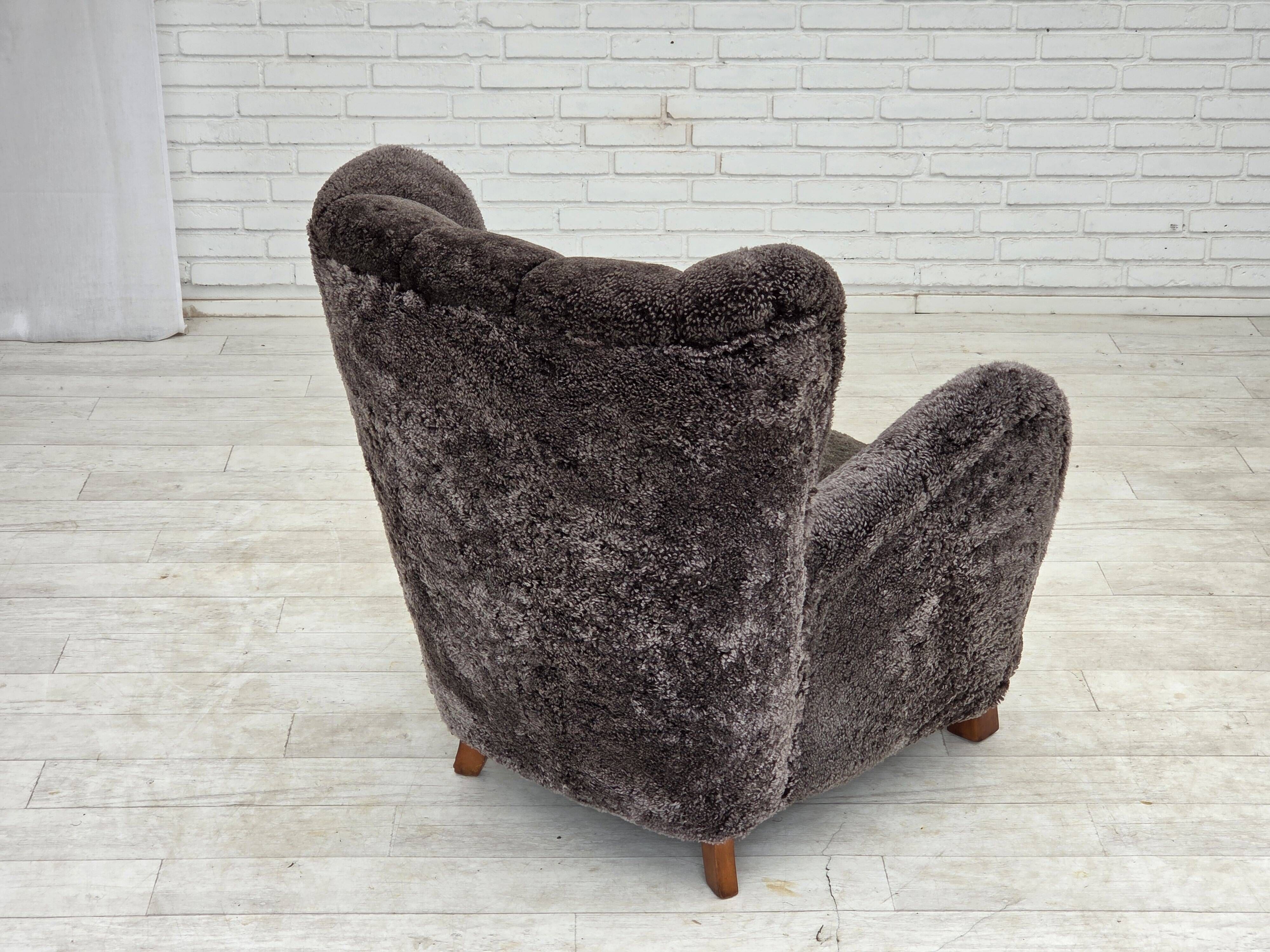 1960s, Danish design, reupholstered armchair, genuine sheepskin.