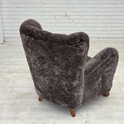 Années 1960, design danois, fauteuil rembourré, véritable peau de mouton.