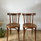 Pair of Baumann curved wood bistro chairs early twentieth century