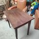 Small patinated solid wood side table with tapered legs - 1900