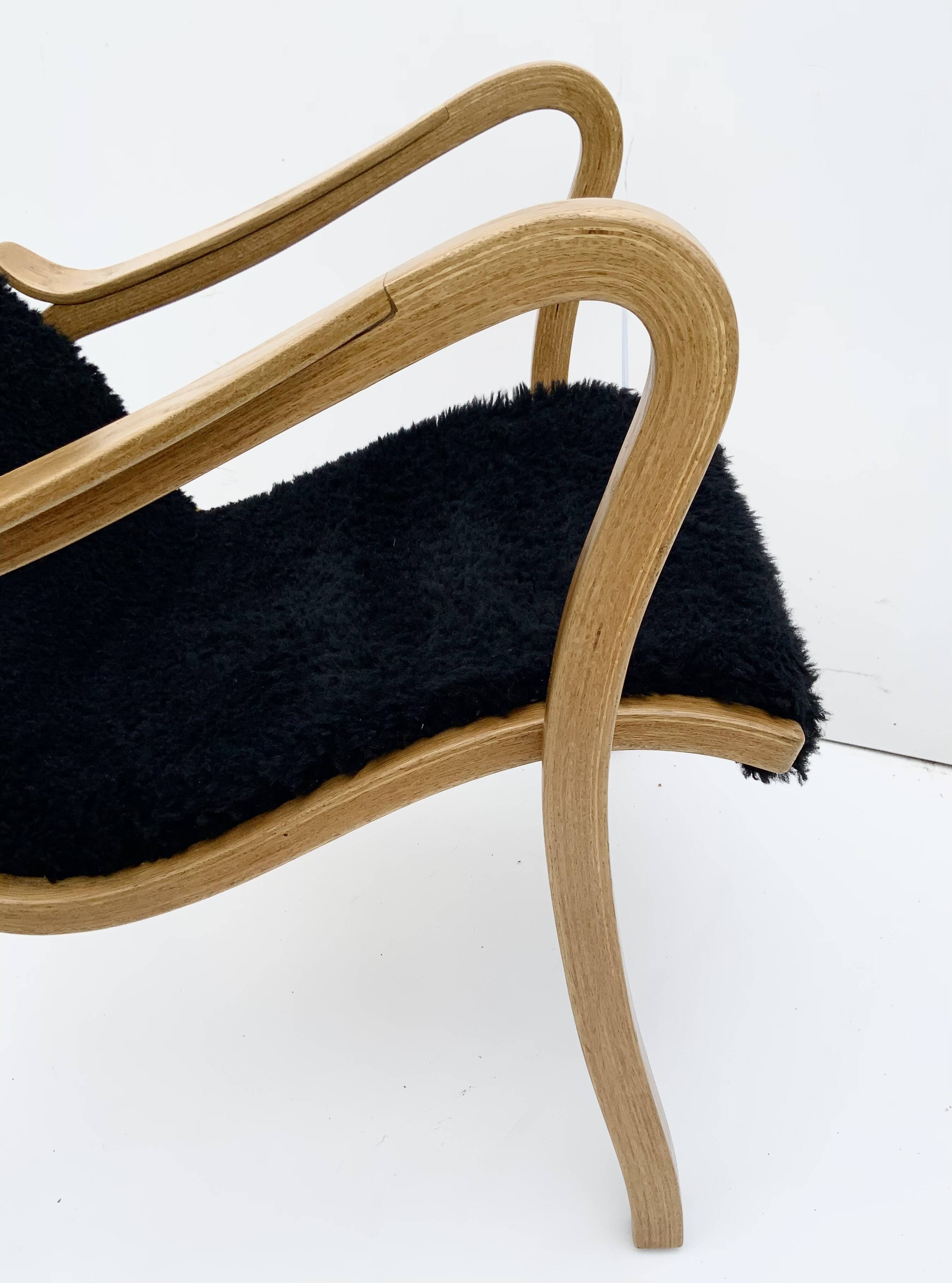 Vintage G.A. Berg “Torparen” Armchair, Oak, Black Sheepskin, Ottoman, 1960s