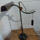 Brass balance lamp. Delmas.
