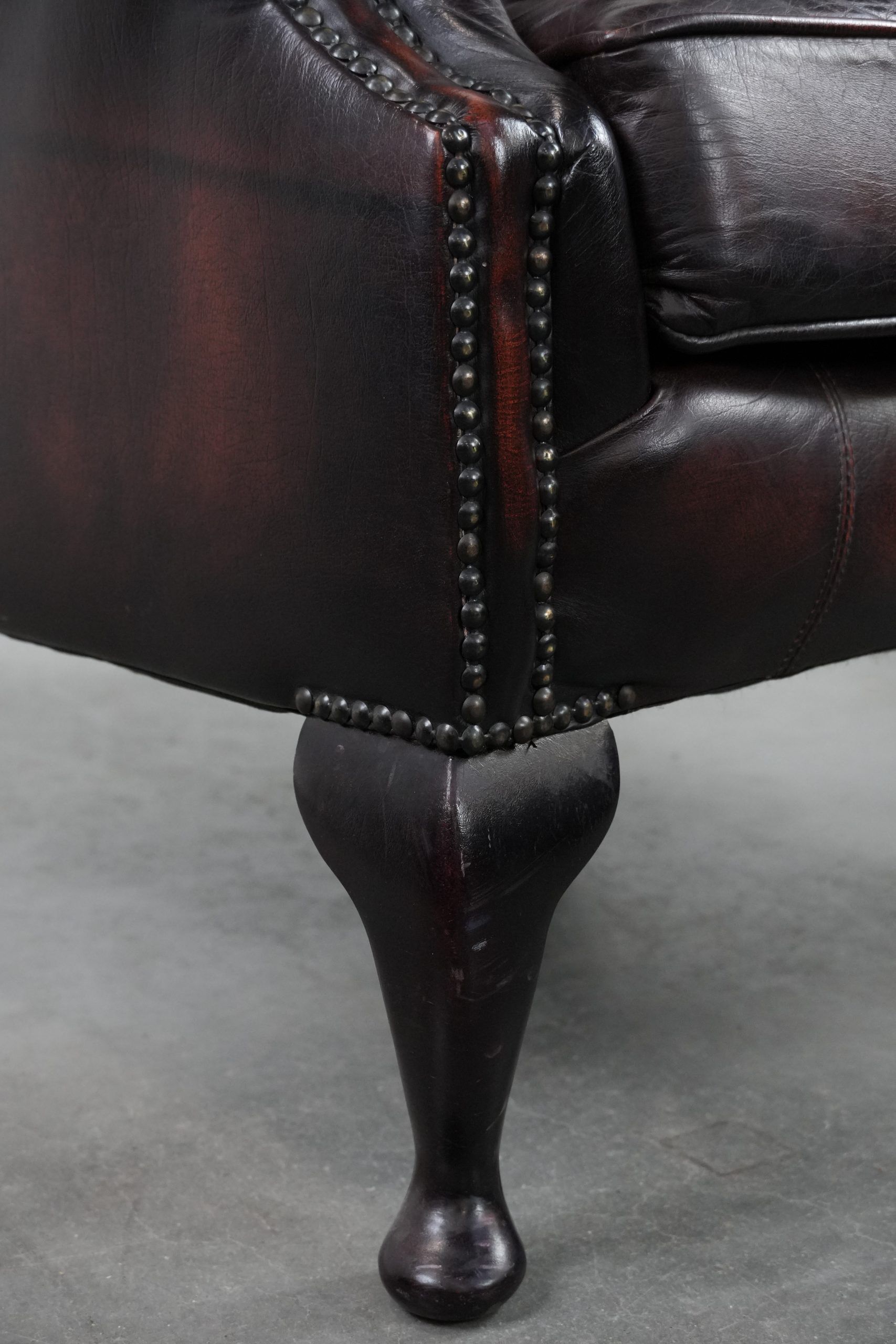 Cowhide leather Chesterfield wingback armchair in classic English style