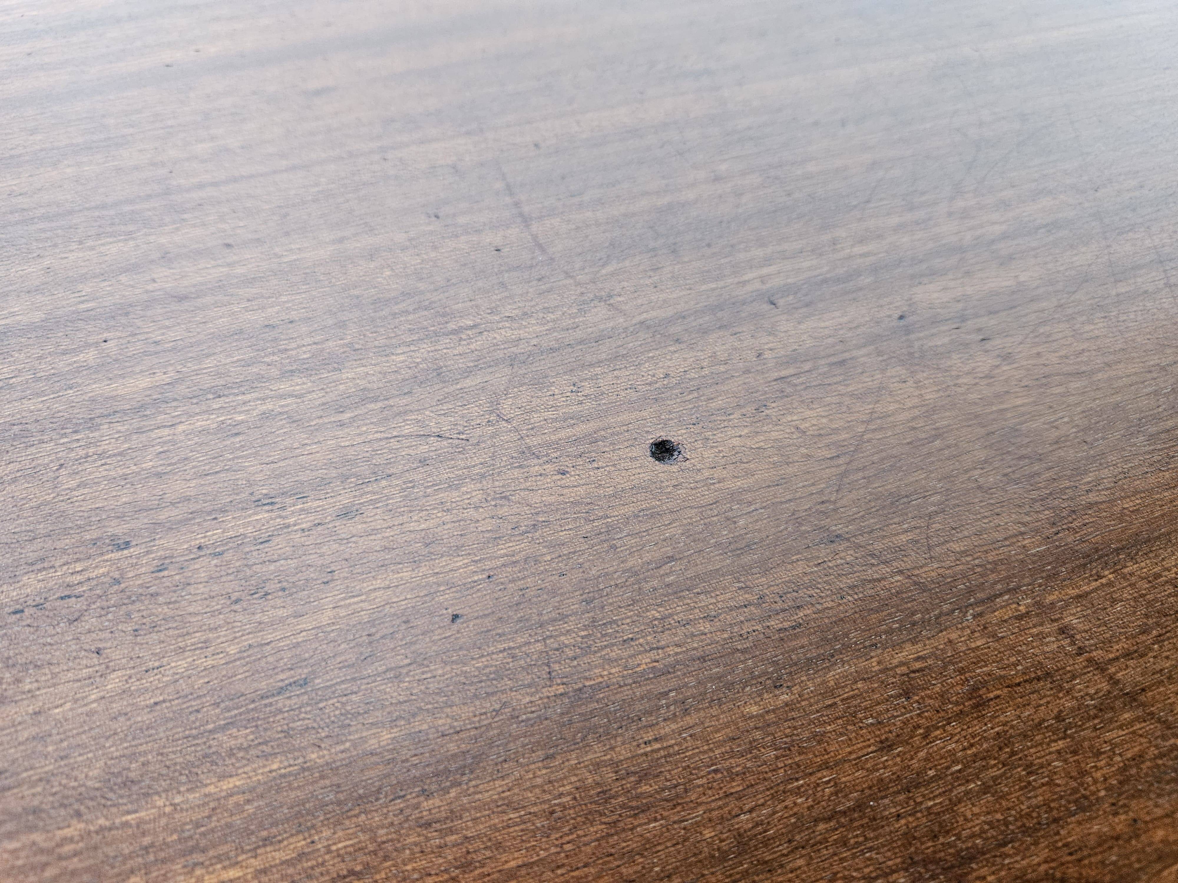 1950s chest of drawers covered in walnut with brass handles