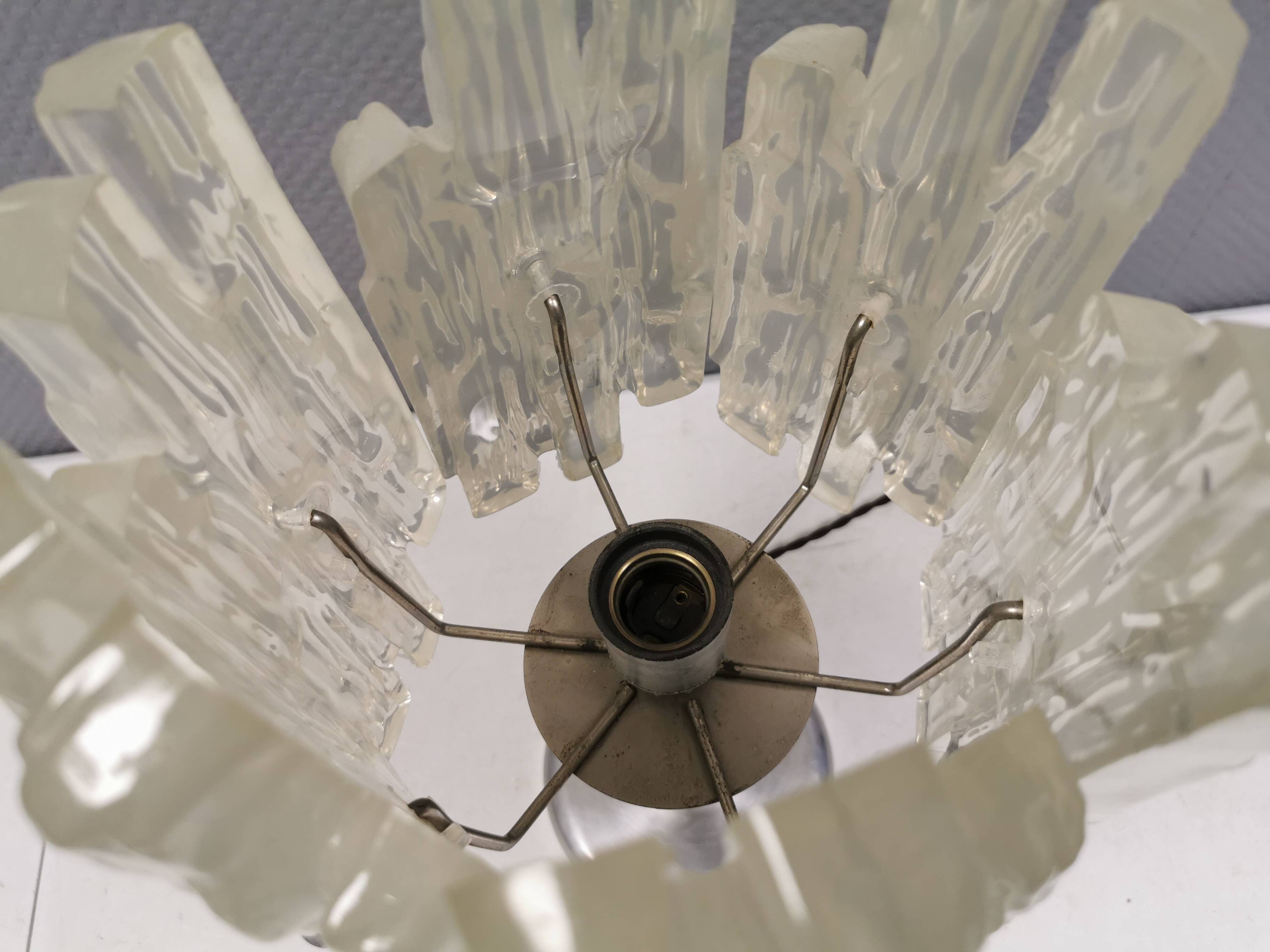 Table lamp with a teak ‘trunk’, silver-coloured metal base, acrylic shade