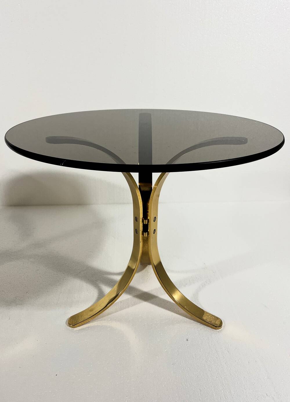 Brass and smoked glass side tables from the 1960s.