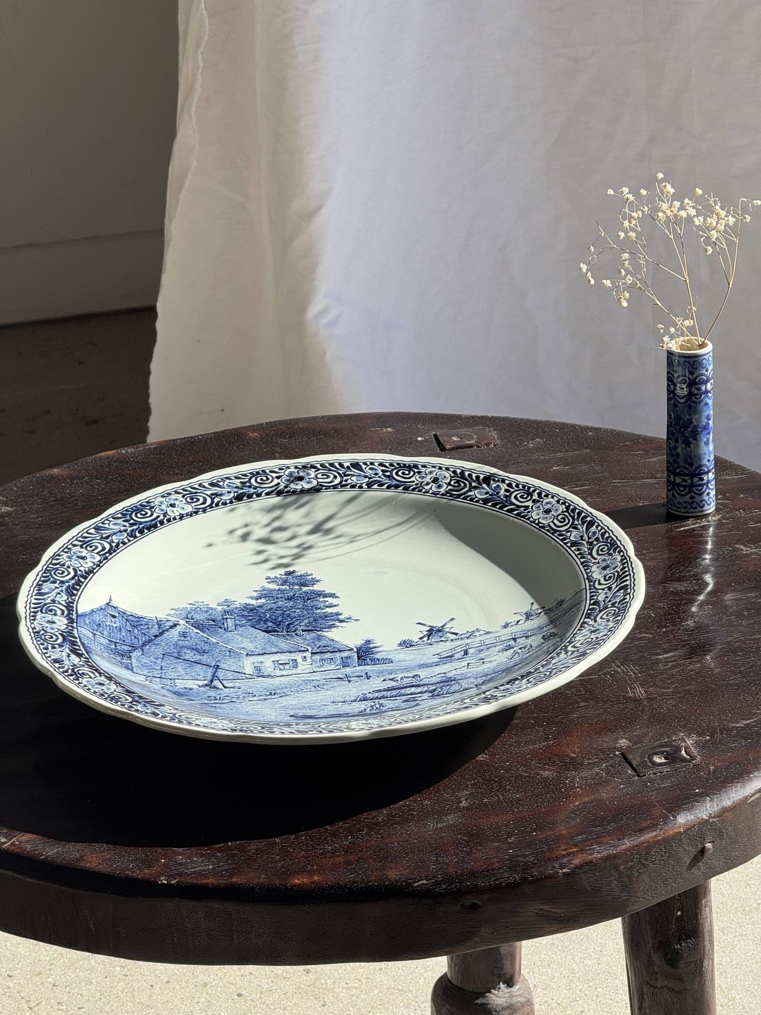 Vintage blue and white earthenware soliflore vase from Portugal.