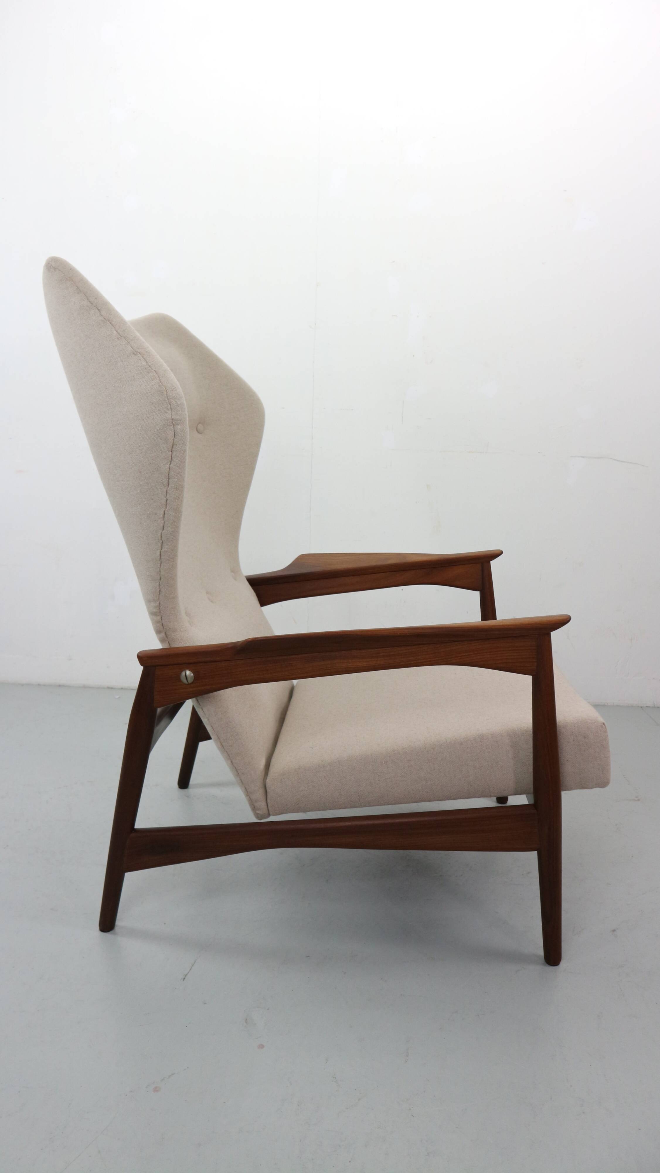 Danish adjustable wingback lounge chair in teak by Ib Kofod Larsen