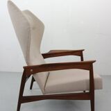 Danish adjustable wingback lounge chair in teak by Ib Kofod Larsen