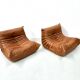 Togo lounge chairs in cognac cow leather attributed to Michel Ducaroy for Ligne Roset, set of 2