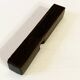 Set of 11 ebony wood knife rests with brass inlay