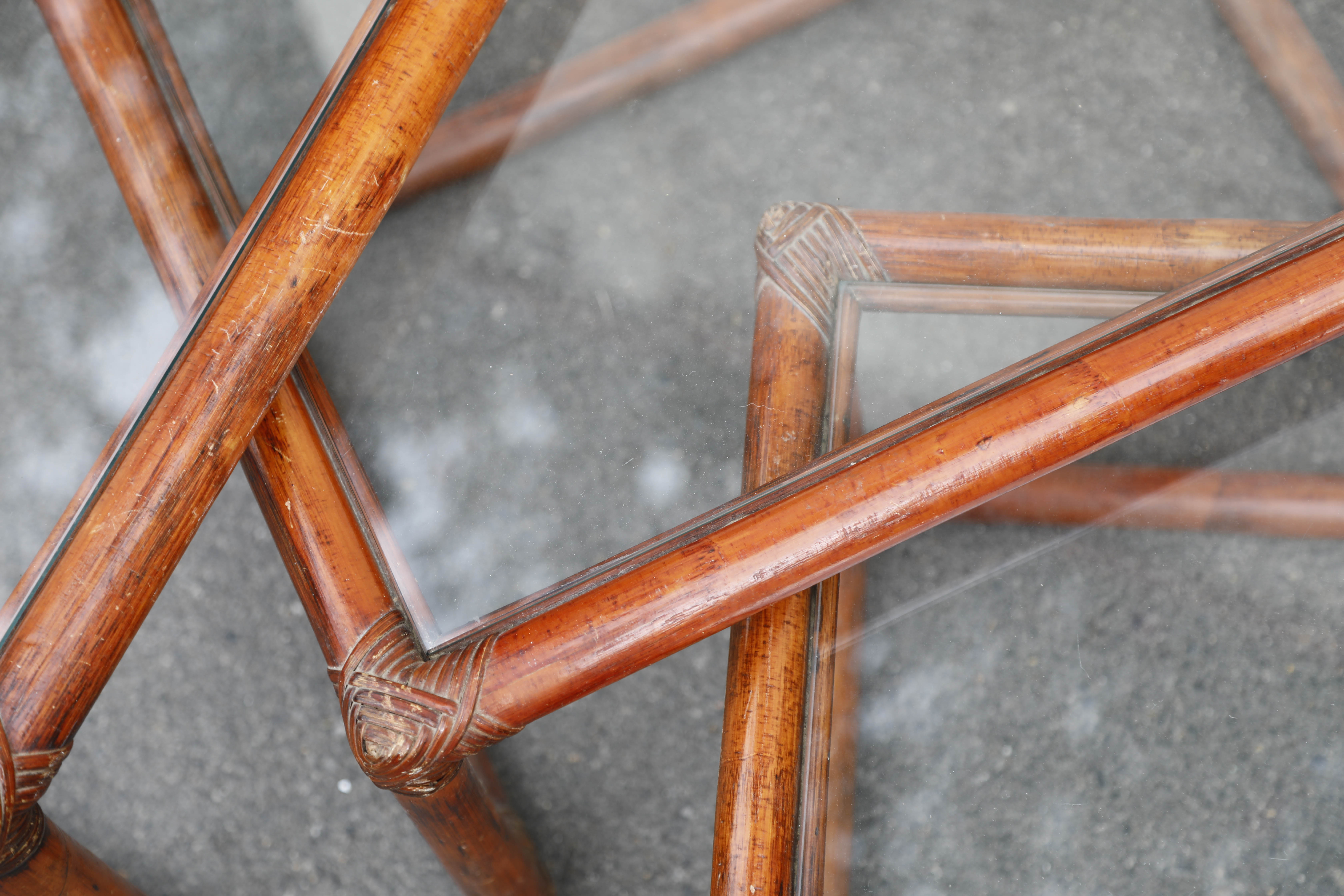 Rattan and glass side tables