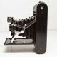 Appareil photo argentique Coronet Folding 6x9 1946 objectif menisque foyer fixe et pochette cuir