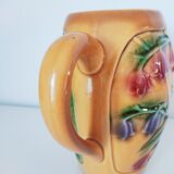 Pichet orangé fleurs en relief