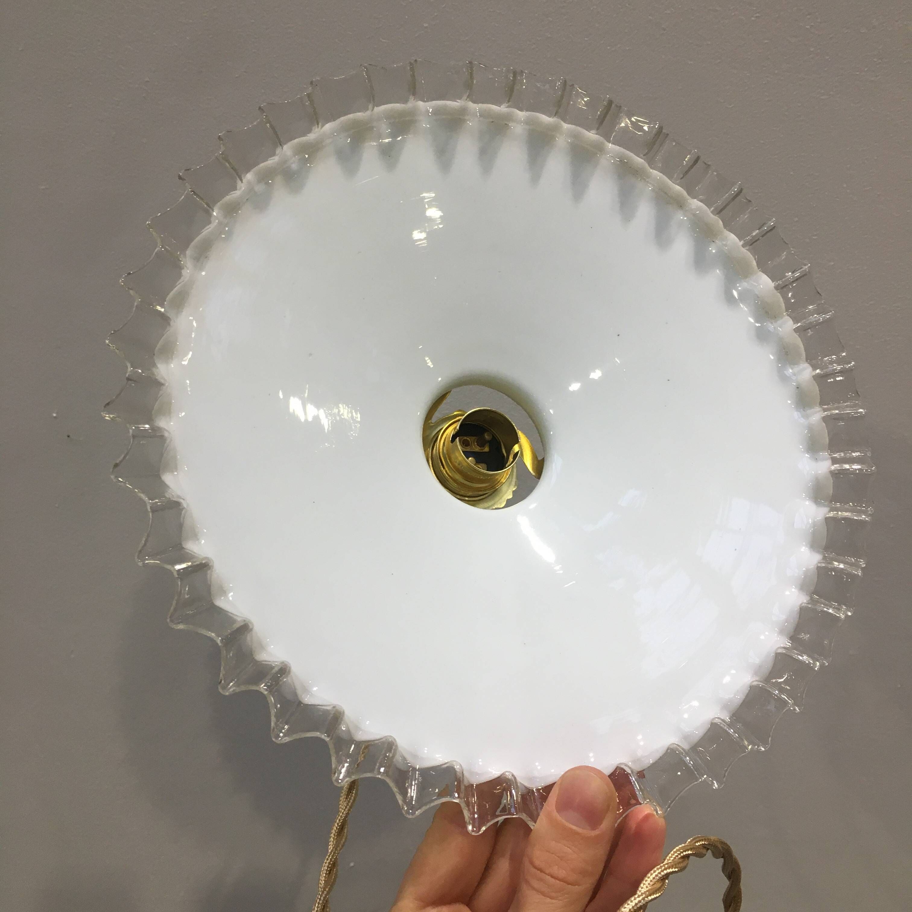 Pair of vintage pendant lights in white opaline and transparent serrated edges