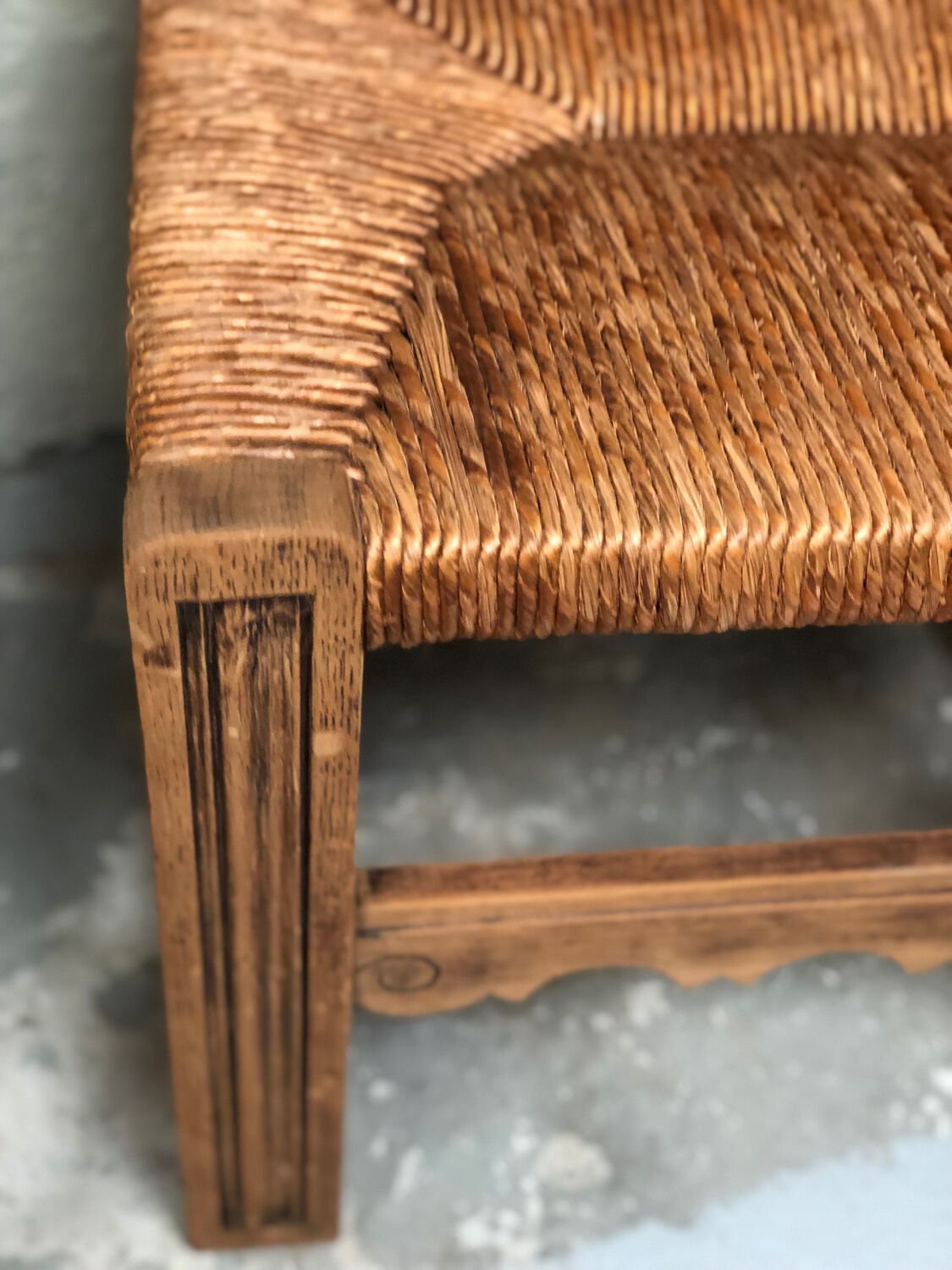 Old straw brutalist chair