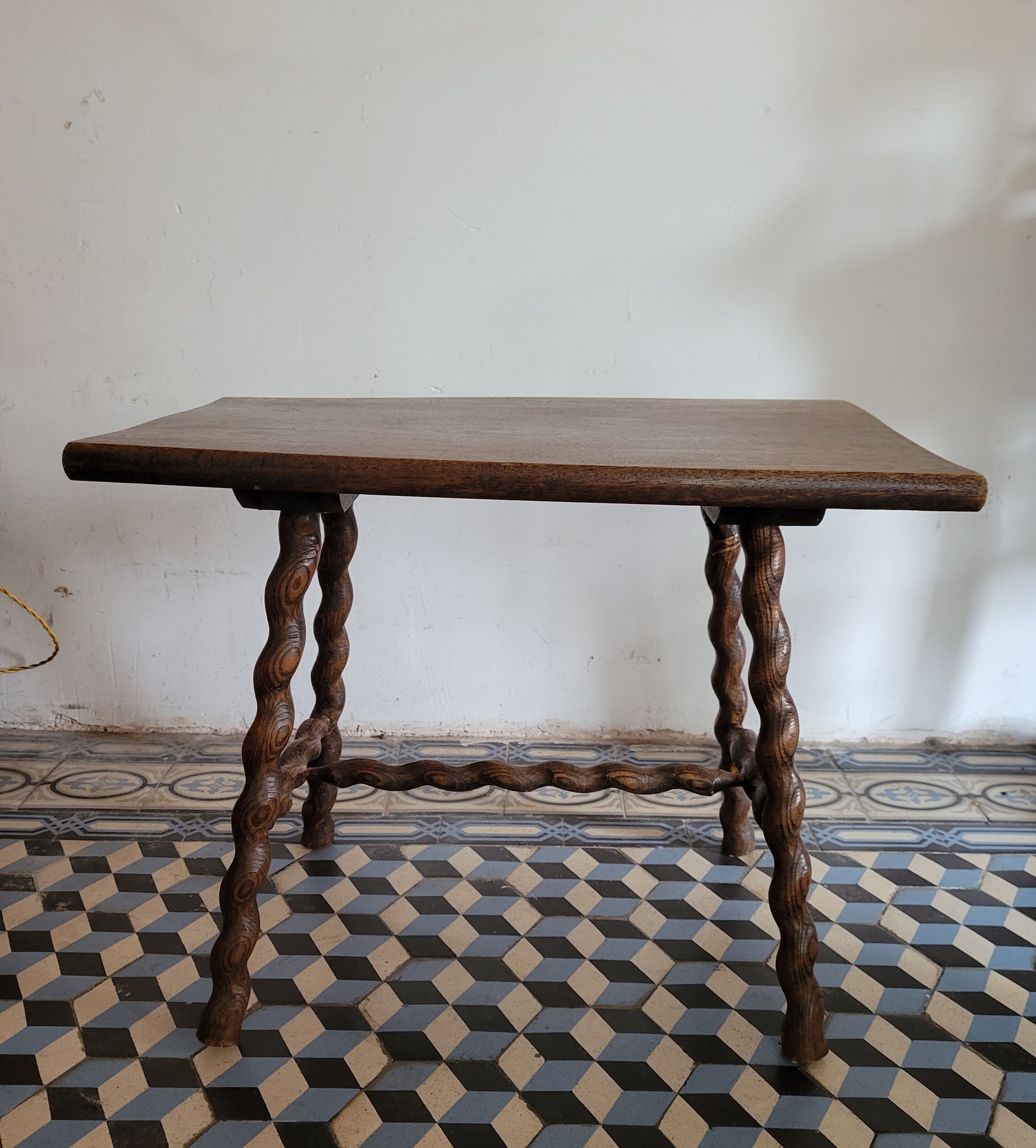 Brutalist coffee table with turned wooden legs