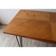 Vintage extendable dining table in wood and metal base, 1950