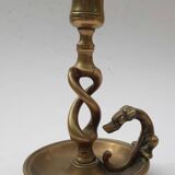 Antique bronze candlestick with dragon-shaped handle from the 17th century