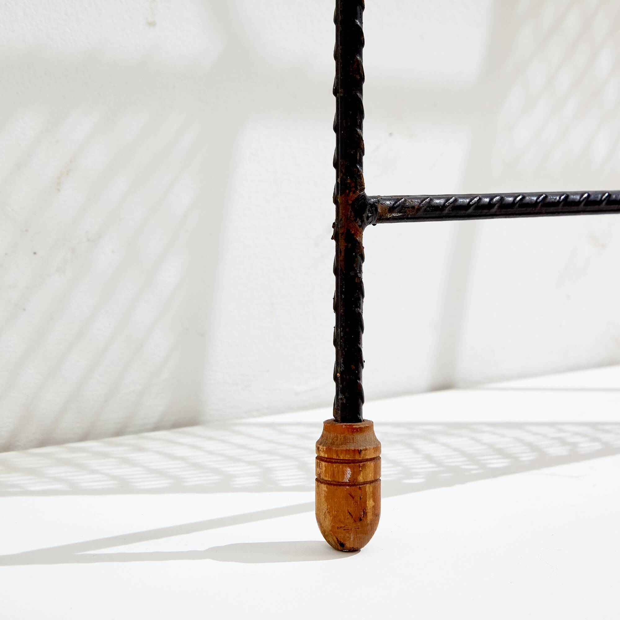 Rattan and metal coat rack