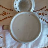 Lemon squeezer and its vintage ceramic pot
