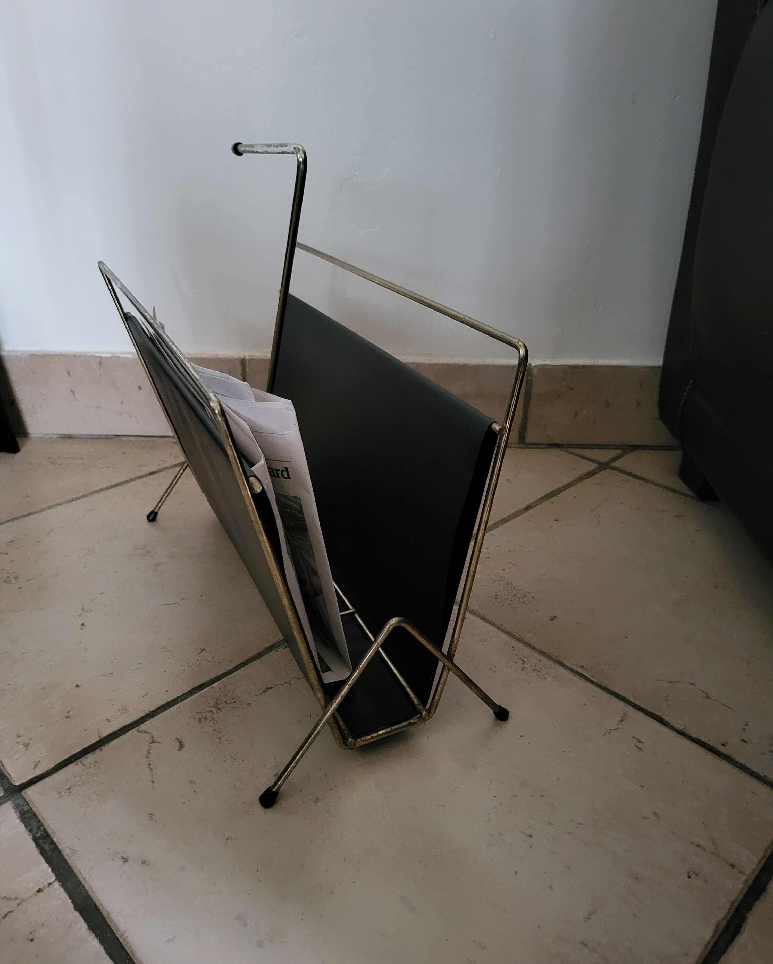 Vintage metal magazine rack in gold and black vinyl Newspaper holder