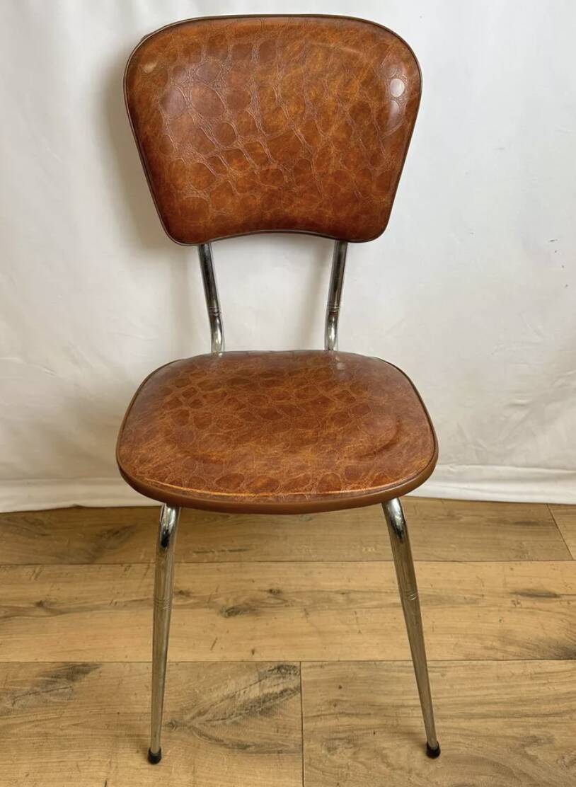 4 chairs in brown skai and chrome metal bases from the 60s