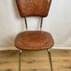 4 chairs in brown skai and chrome metal bases from the 60s