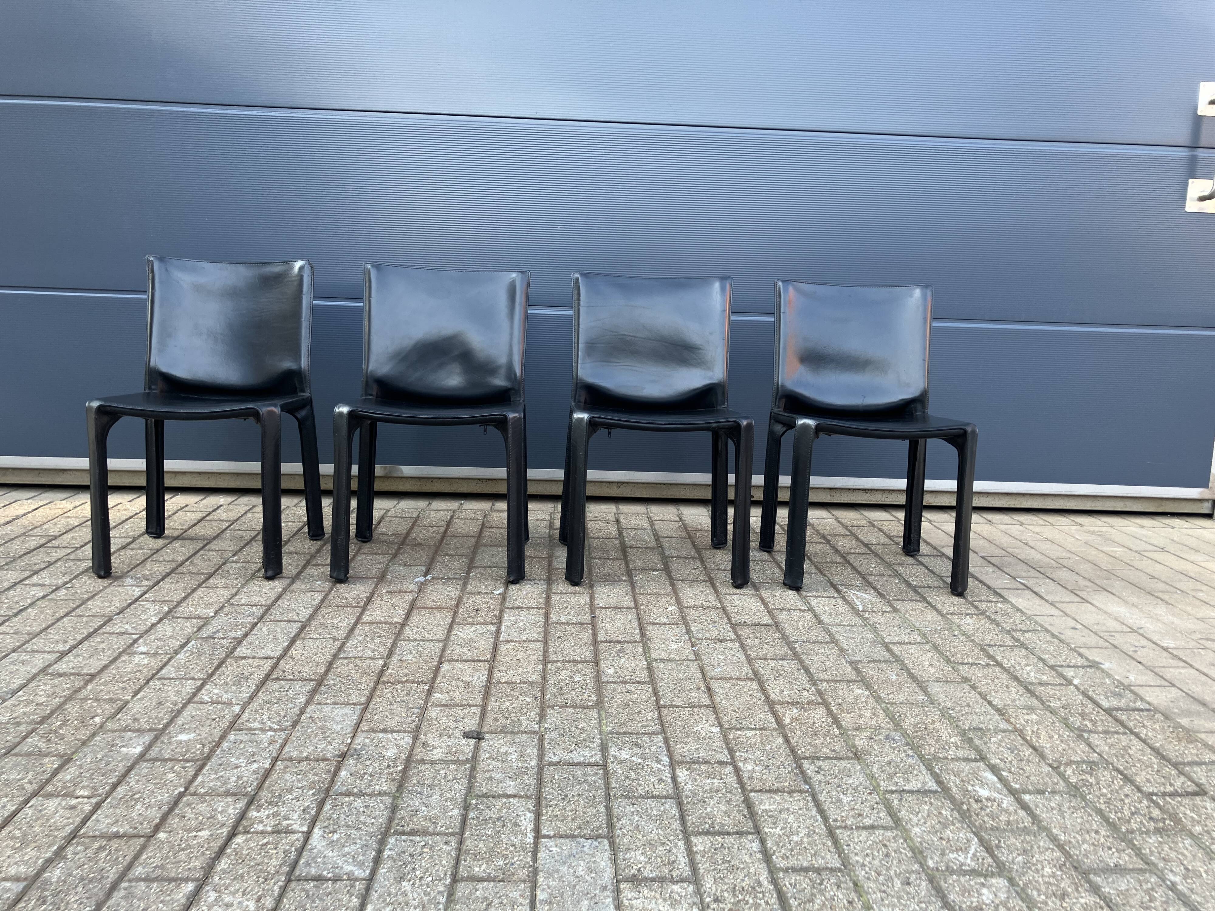 4 black Cassina Cab chairs by Mario Bellini