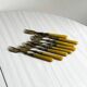 Set of 8 vintage gold metal dessert forks