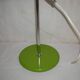 Green desk lamp with an arm from the 1970s.