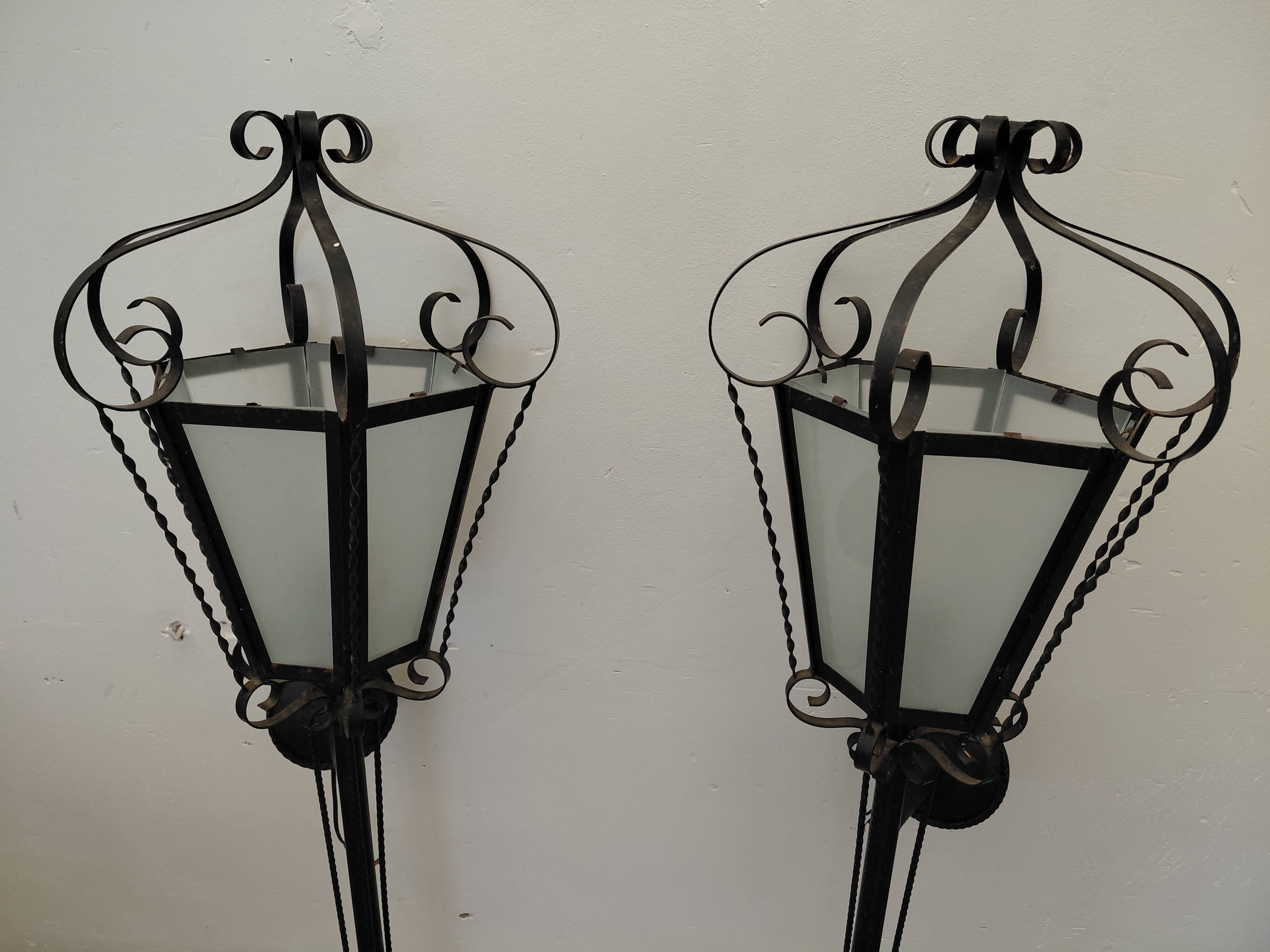 Pair of wrought iron wall sconces, 1950