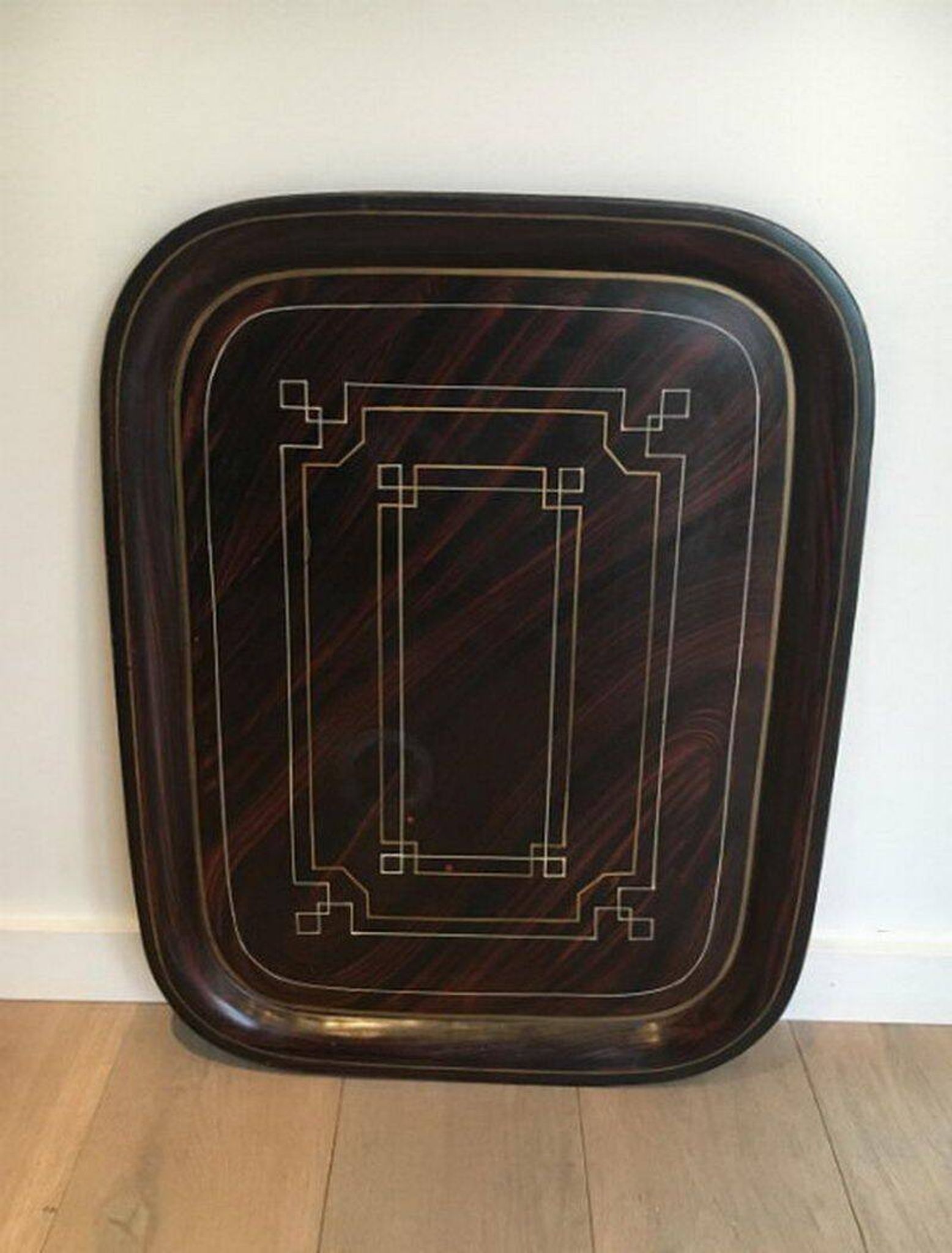 Beautiful table with a brass top and painted sheet metal