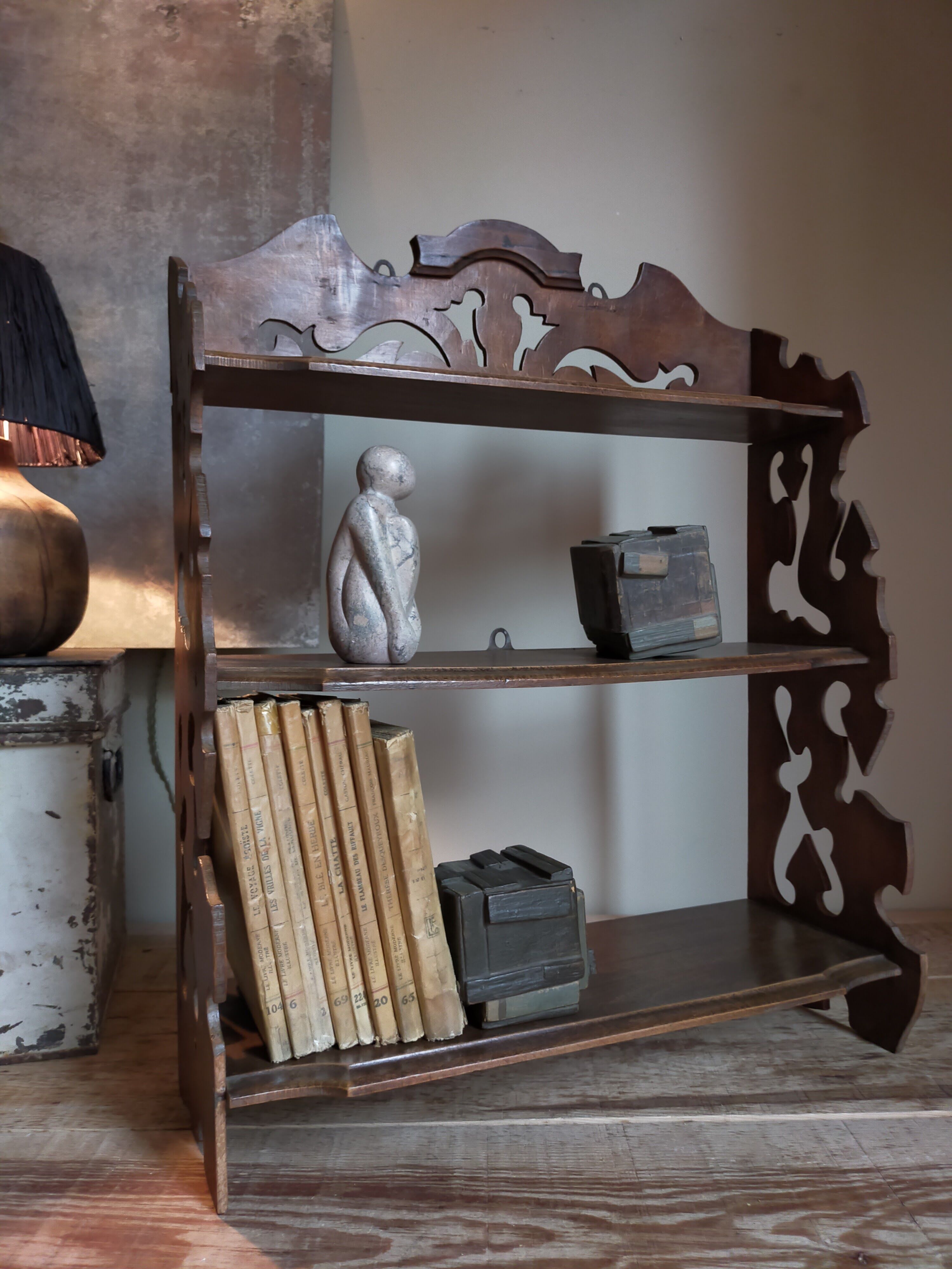 Old carved wooden wall shelf