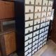 Large black and white industrial chest of drawers in pine, 40 drawers, 1950s.