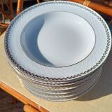 Twelve white porcelain plates