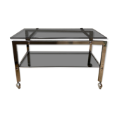 Vintage coffee table on chrome wheel and smoked glass