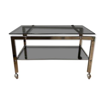 Vintage coffee table on chrome wheel and smoked glass