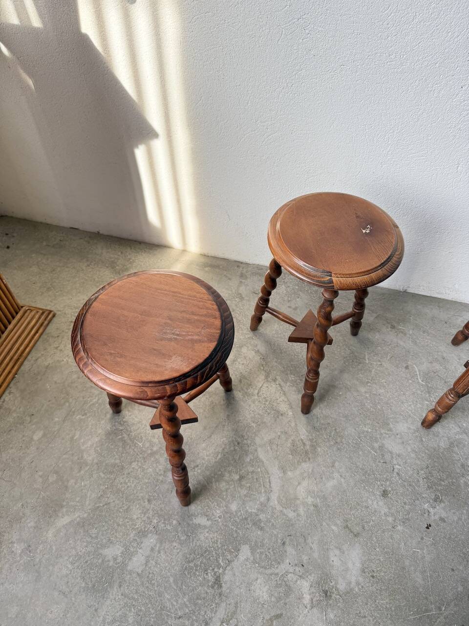 Set of 4 turned oak stools.