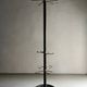 Minimalist black metal brass coat stand