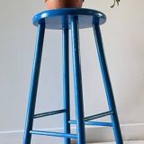 Vintage wooden stool with electric blue paint