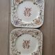 Série de 8 assiettes terre de fer Longchamp