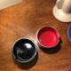 2 vintage ashtrays Isamu Kenmochi space age black and red Japan 1960