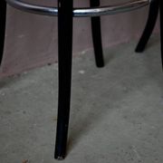 Pair of 1960s bistro bar stools in black and chrome with vinyl shell.