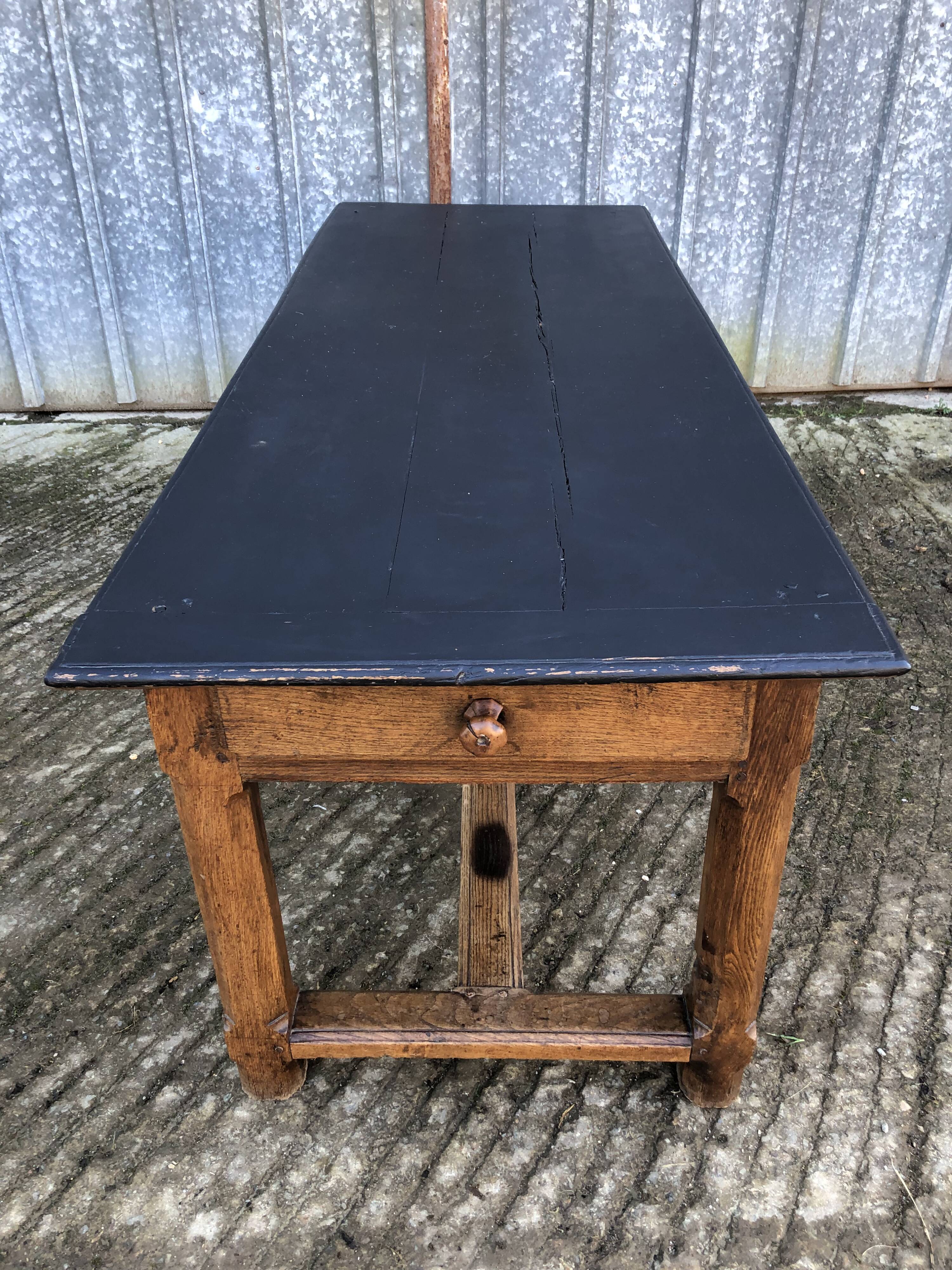 Antique oak farmhouse table with cat bar and 2 end drawers